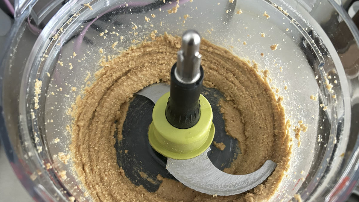 Breville Paradice 9 in use, cashew butter in bowl