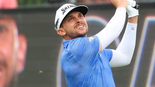 John Catlin takes a shot during LIV Golf Greenbrier