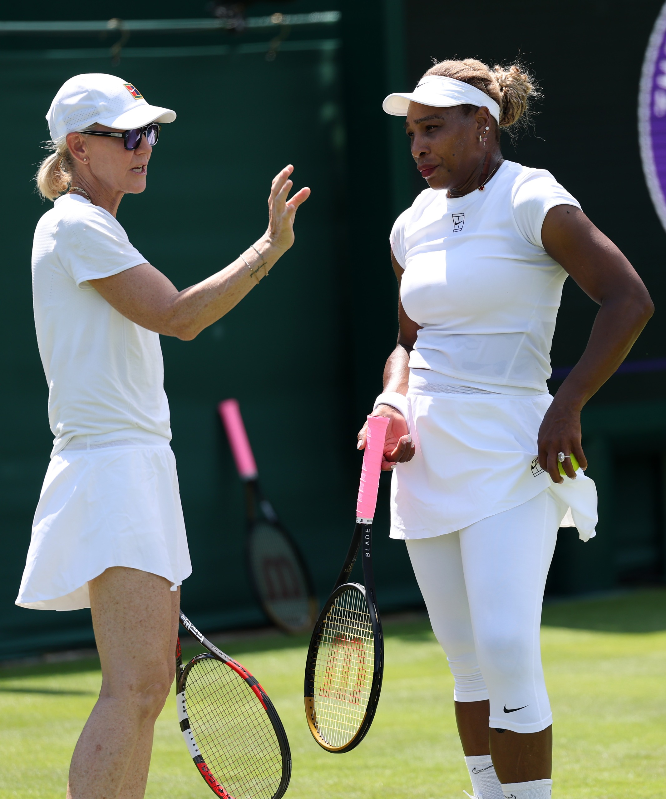 Serena Williams speaks with coach Rennae Stubbs during a training session before The Championships Wimbledon 2026 at All England Lawn Tennis and Croquet Club on June 27, 2026 in London, England