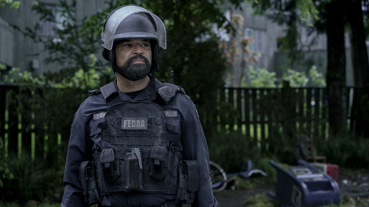 Isaac wearing a military uniform, helmet, and bulletproof vest in The Last of Us season 2 episode 4