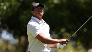 Tiger Woods takes a shot in the third round of The Masters