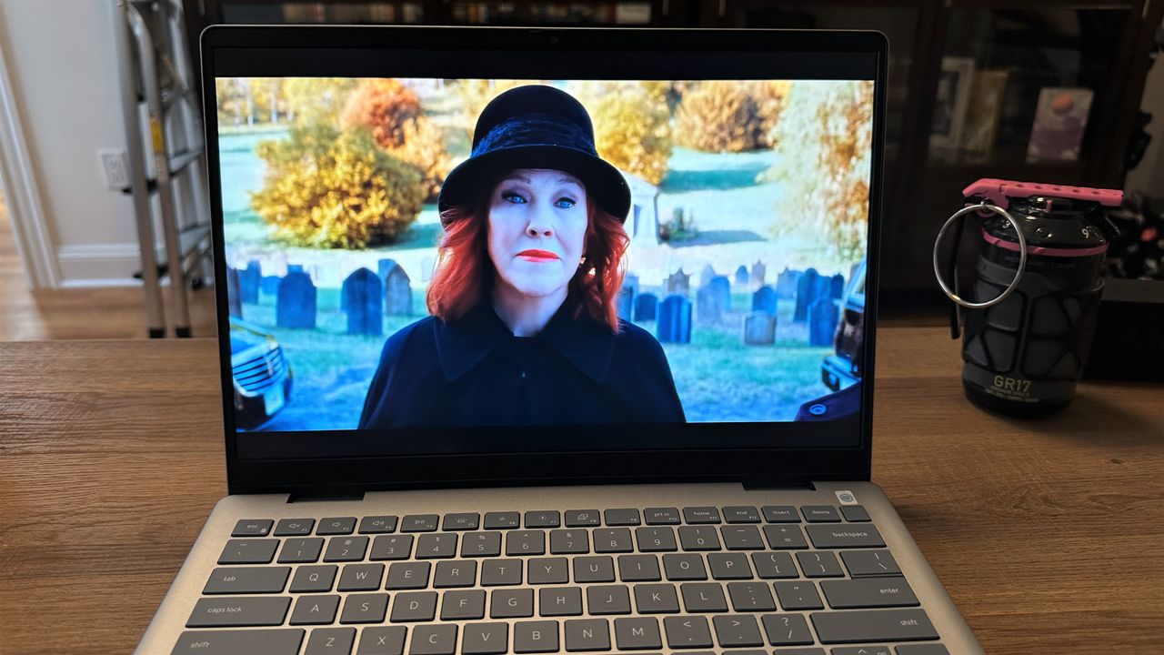 Dell Inspiron 14 Plus (7440) showing a movie trailer on its display.