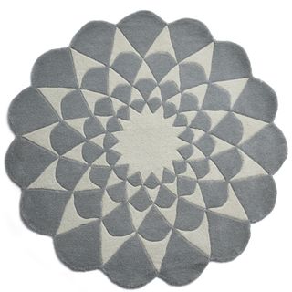 grey coloued hand tufted lotus rug with background