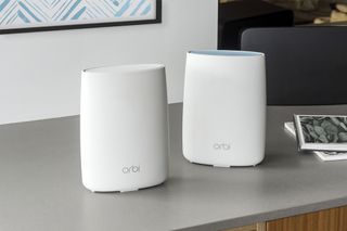 The RBK40 Netgear Orbi system, with a standing satellite matching the router. Credit: Netgear