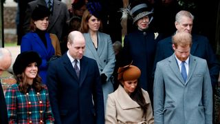 Meghan Markle and Catherine, Duchess of Cambridge curtsey flanked by Prince William, Duke of Cambridge and Prince Harry who bow as they see Queen Elizabeth II