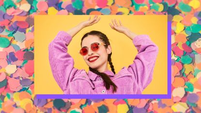 woman in colorful outfit looking happy, empowered