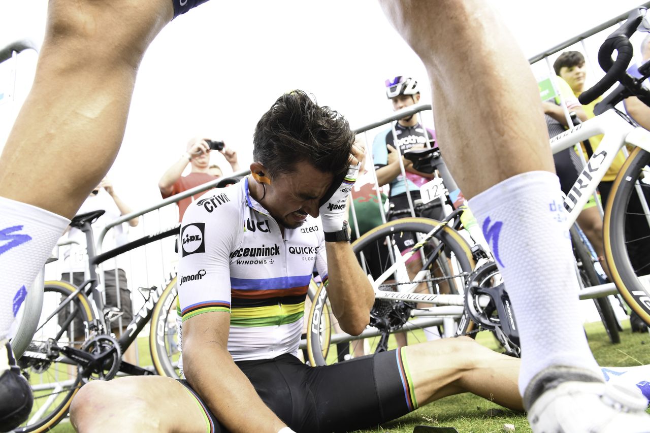 Picture by SWpix.com - 08/09/2021 - Cycling - AJ Bell Tour of Britain Stage 4 - Aberaeron to Great Orme, Llandudno, England - Deceuninck Quick-Step's Juliane Alaphilippe distraught after losing out to Jumbo Visma's Wout Van Aert on the line at the top of Great Orme.