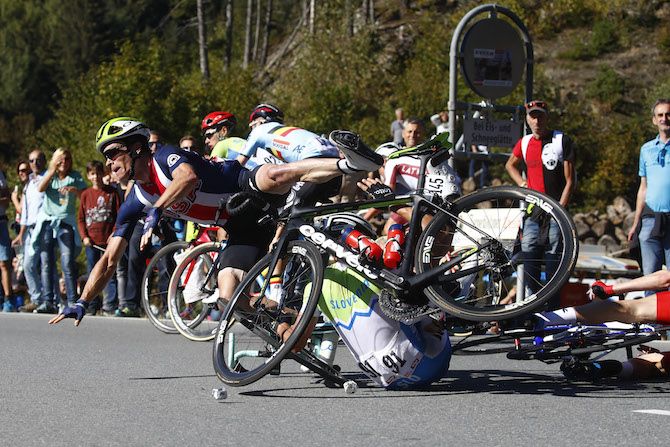 Ben King (USA) crashes with Slovenia's Primoz Roglic at the 2018 elite men's Worlds road race