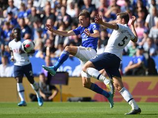 Jan Vertonghen, right, battles for possession with Leicester’s Jamie Vardy