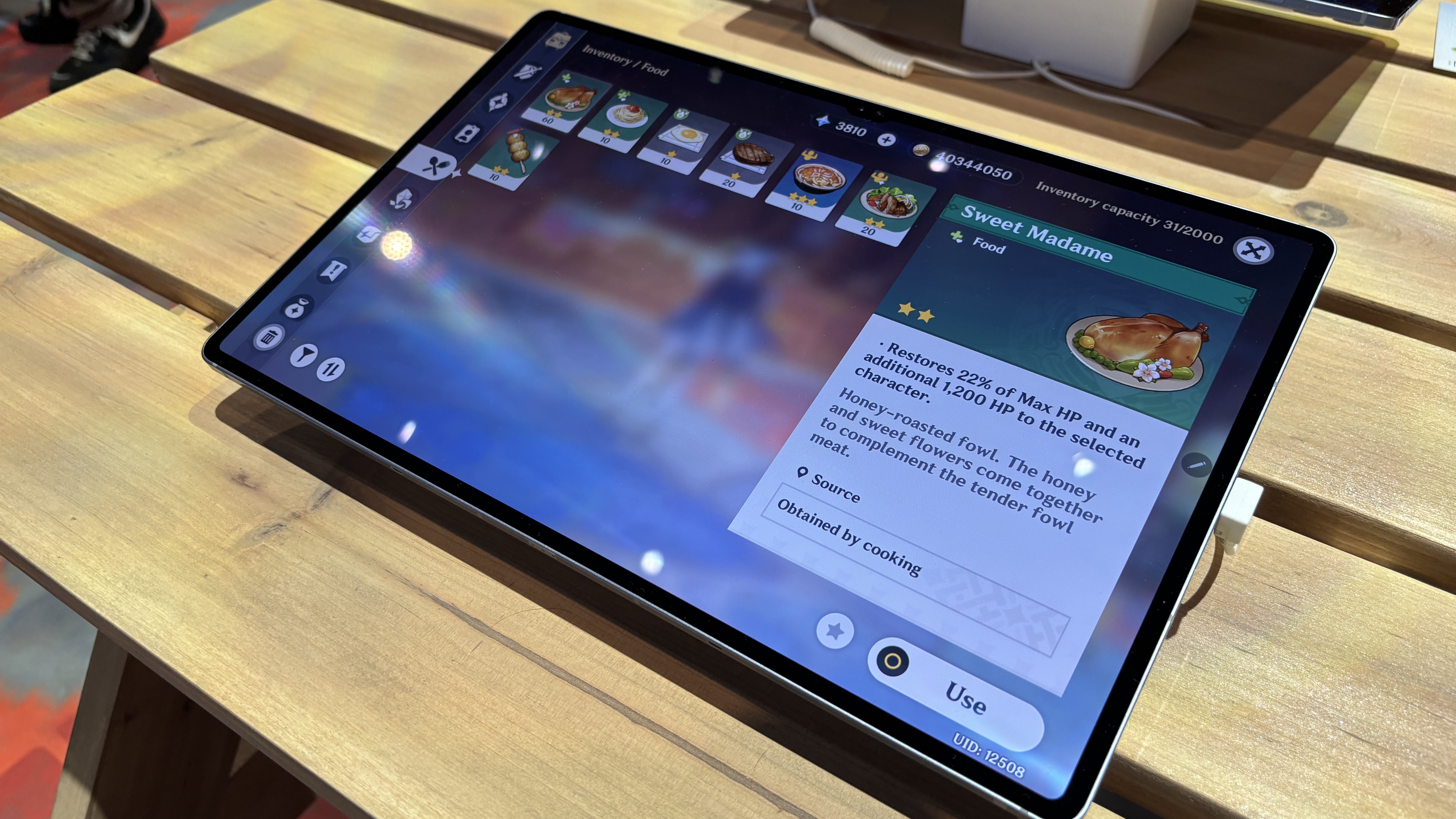 The Samsung Galaxy Tab S10 Ultra running Genshin Impact.