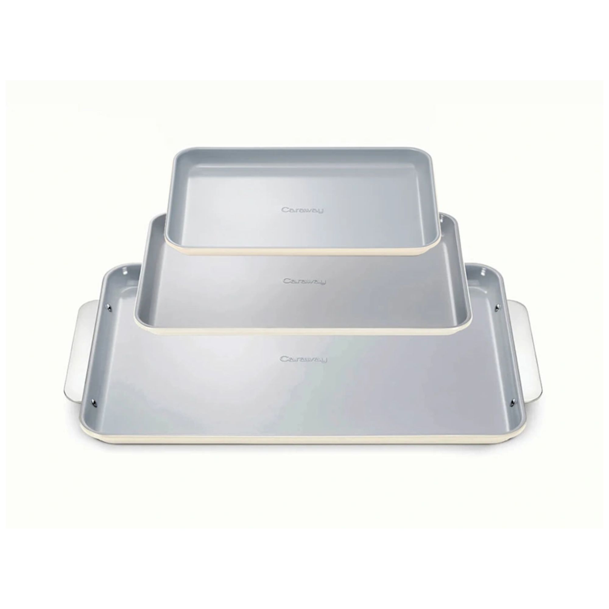 Three cream baking trays with silver tops.