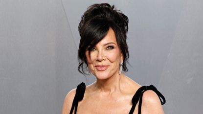 kris jenner on a gray background