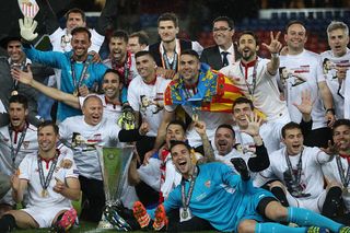 Sevilla players celebrate with the trophy during the UEFA Europa League Final match between Liverpool and Sevilla at St. Jakob-Park on May 18, 2016 in Basel, Switzerland . (Photo by Ian MacNicol/Getty Images)