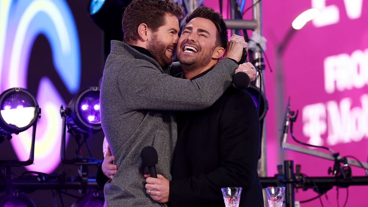 Jaymes Vaughan (L) and Jonathan Bennett speak onstage during the Times Square New Year&#039;s Eve 2022 Celebration on December 31, 2021 in New York City