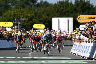 LAVAL, FRANCE - JULY 12: Stage winner Jonathan Milan of Italy and Team Lidl - Trek - Green Sprint Jersey sprints at finish line during the 112th Tour de France, Stage 8 a 197km stage from Saint-Meen-le-Grand to Laval (Espace Mayenne) / #UCIWT / on July 12, 2025 in Laval, France.