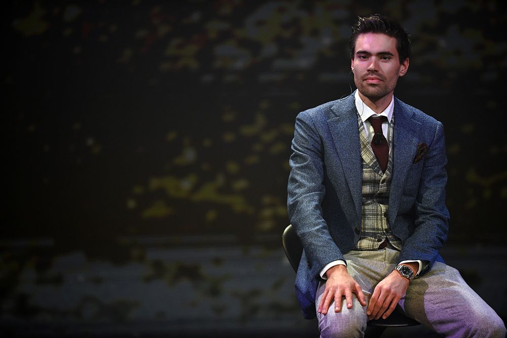 2017 Giro d'Italia winner Tom Dumoulin sits on stage at the 2018 event announcement