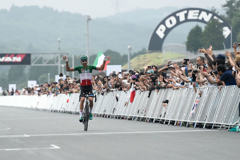 Davide Formolo celebrates his teammate's win