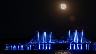 Moon over Tappan Zee Bridge at night