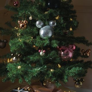christmas tree with mini disco balls and disney baubles
