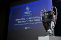 The Champions League trophy on the stage where the Champions League knockout draw will take place.