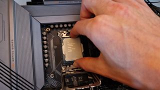 Intel Core i7-13700K being installed