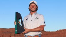 Austin Smotherman with the Bank of Utah Championship trophy 