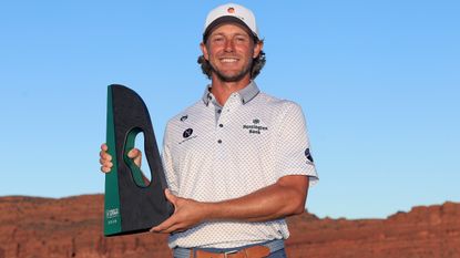 Austin Smotherman with the Bank of Utah Championship trophy