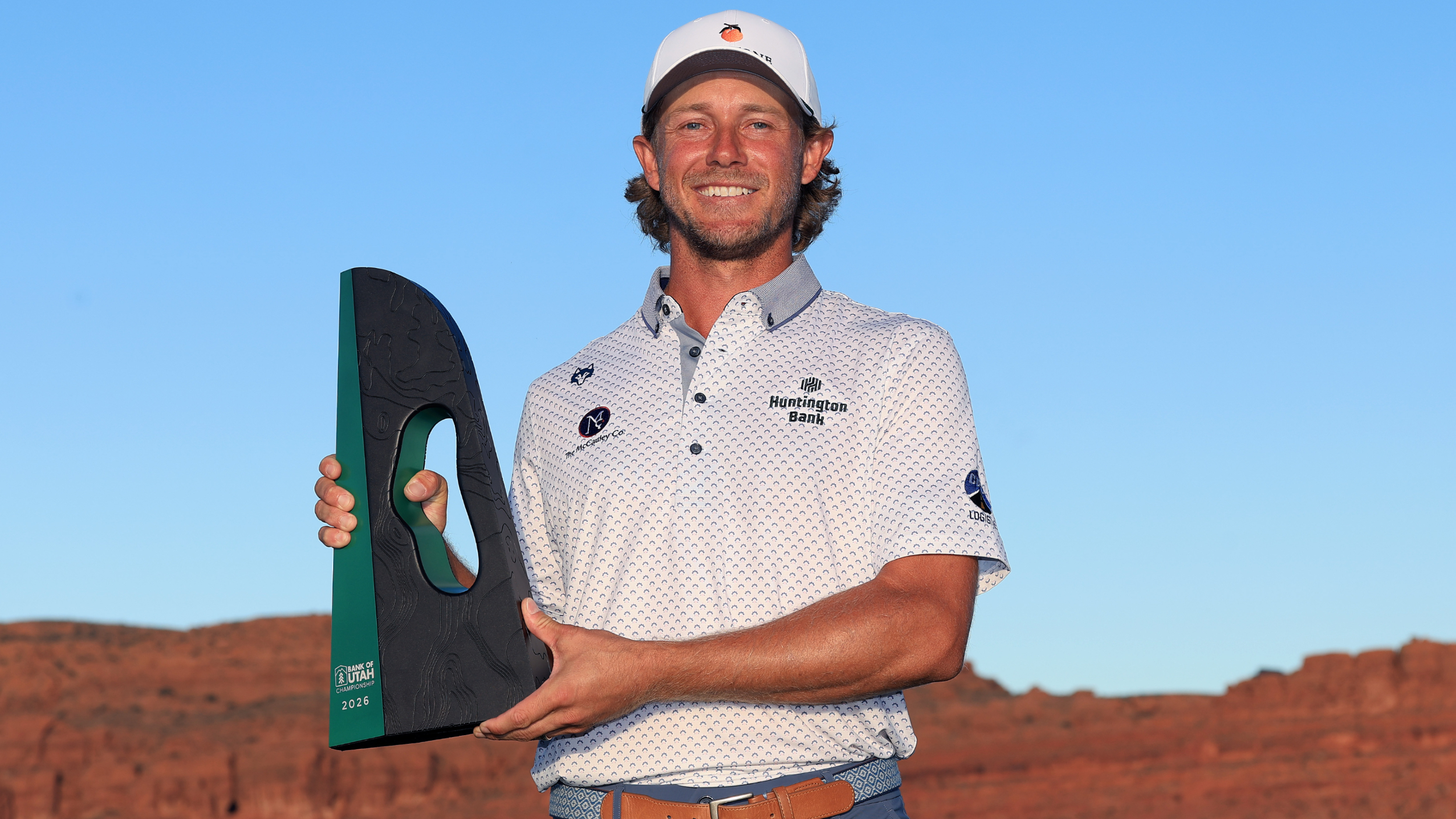 Austin Smotherman with the Bank of Utah Championship trophy  