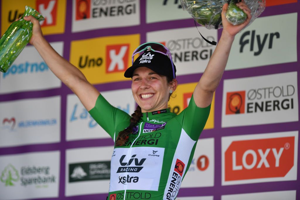 SARPSBORG NORWAY AUGUST 11 Alison Jackson of Canada and Team Liv Racing Xstra Green Points Jersey celebrates at podium during the 8th Tour of Scandinavia 2022 Battle Of The North Stage 3 a 1189km stage from Moss to Sarpsborg UCIWWT tourofscandinavia TOSC22 on August 11 2022 in Sarpsborg Norway Photo by Luc ClaessenGetty Images