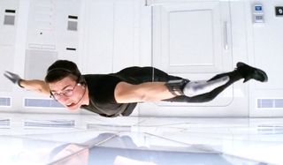 Mission: Impossible Ethan Hunt Tom Cruise almost touches floor