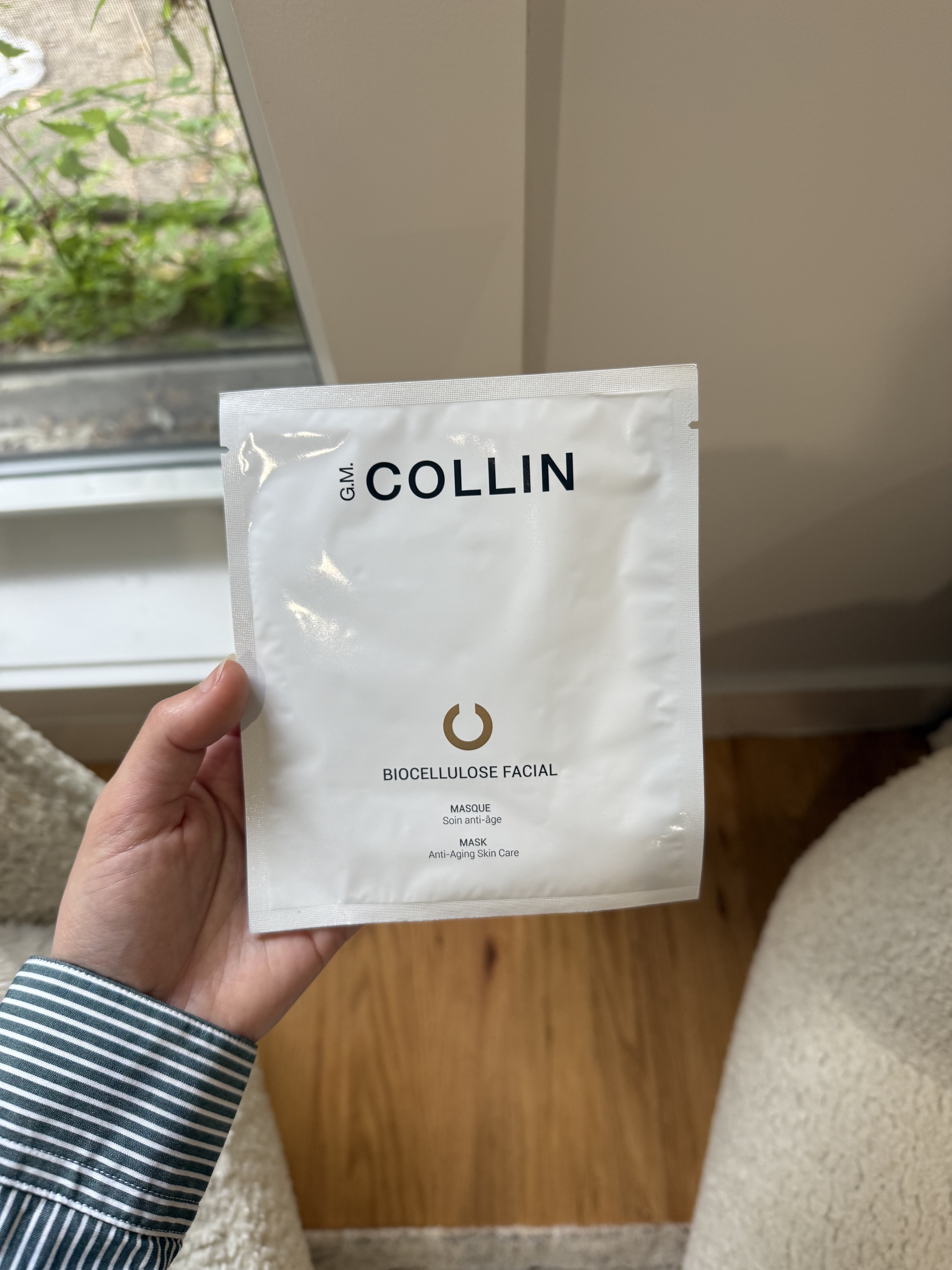 Photo of Jamie Schneider testing the G.M. Collin sheet mask