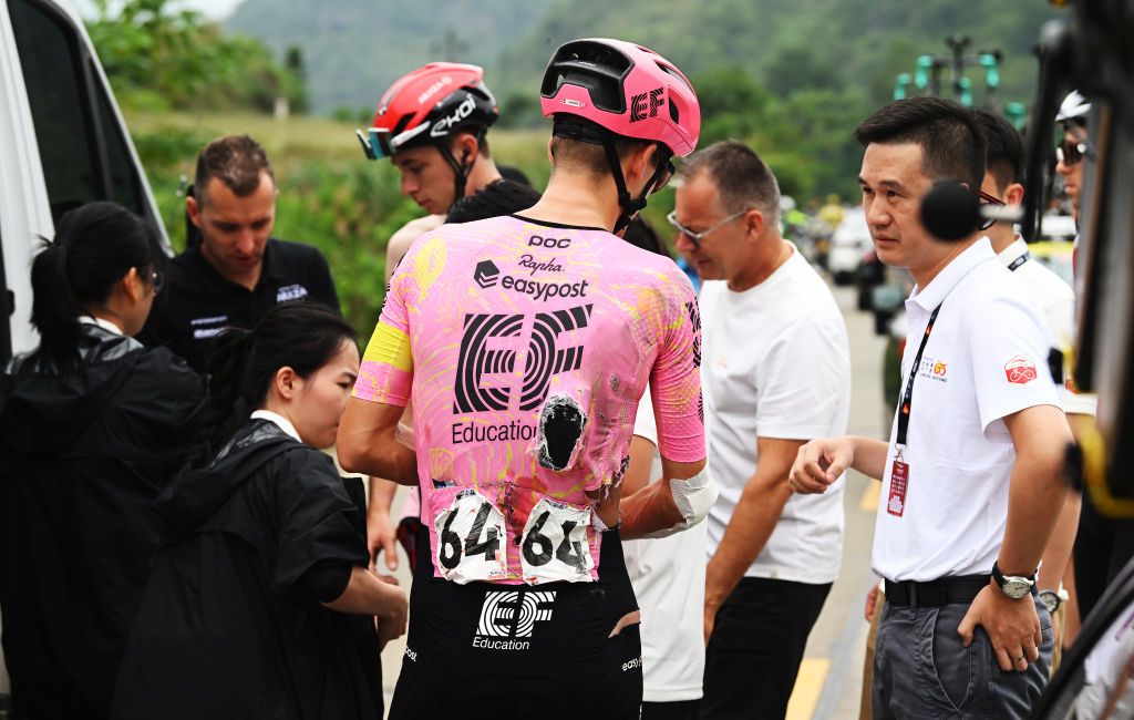 BAMA CHINA OCTOBER 17 Mikkel Frolich Honore of Denmark and Team EF Education EasyPost is treated by medical services during the 5th GreeTour Of Guangxi 2024 Stage 3 a 214km stage from Jingxi to Bama UCIWT on October 17 2024 in Bama China Photo by Dario BelingheriGetty Images