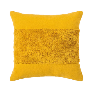 A bright yellow throw cushion with tufted detailing