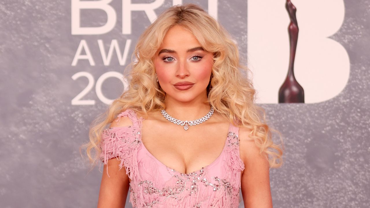 Sabrina Carpenter wears a pink McQueen gown to the BRIT Awards 2025