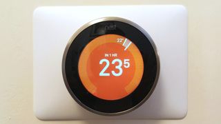 Google Nest Learning Thermostat mounted on wall