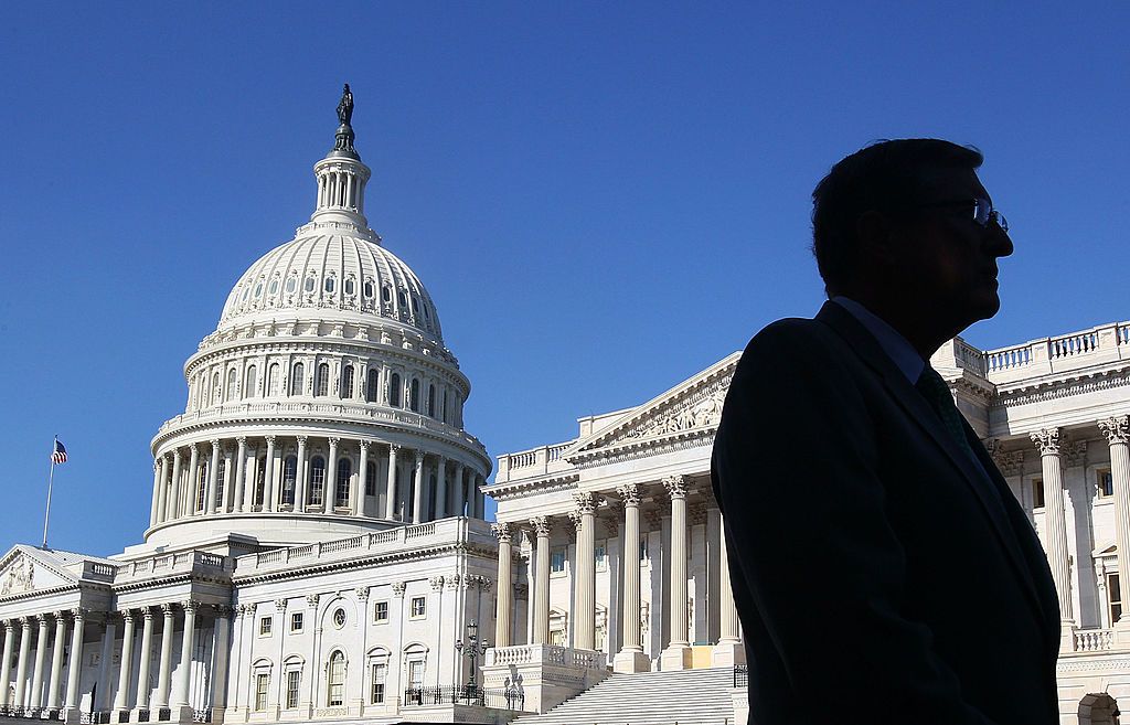 Senator standing outside of U.S. Capitol.