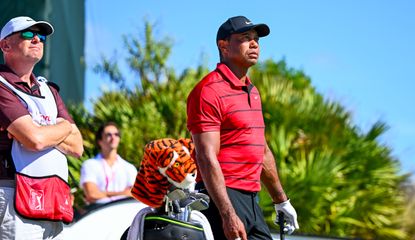 Tiger Woods watches on 