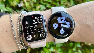 Apple Watch 9 and Google Pixel Watch 2 on a person's wrist