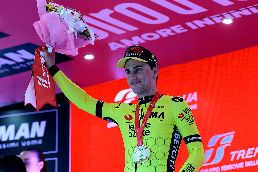 Team Visma-Lease a Bike's Dutch rider Olav Kooij celebrates on the podium after victory in the 12th stage of the 108th Giro d'Italia cycling race of 172kms from Modena to Viadana on May 22, 2025. (Photo by Luca Bettini / AFP)