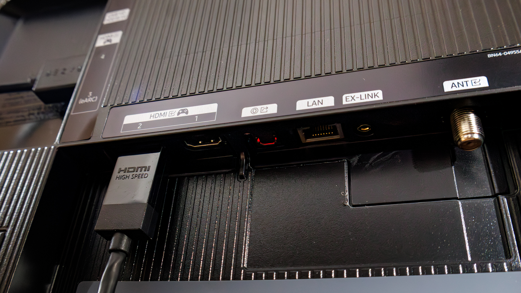 Samsung OLED S85F TV on a table