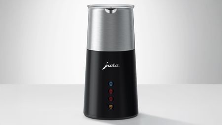Jura Automatic Milk Frother on gray background