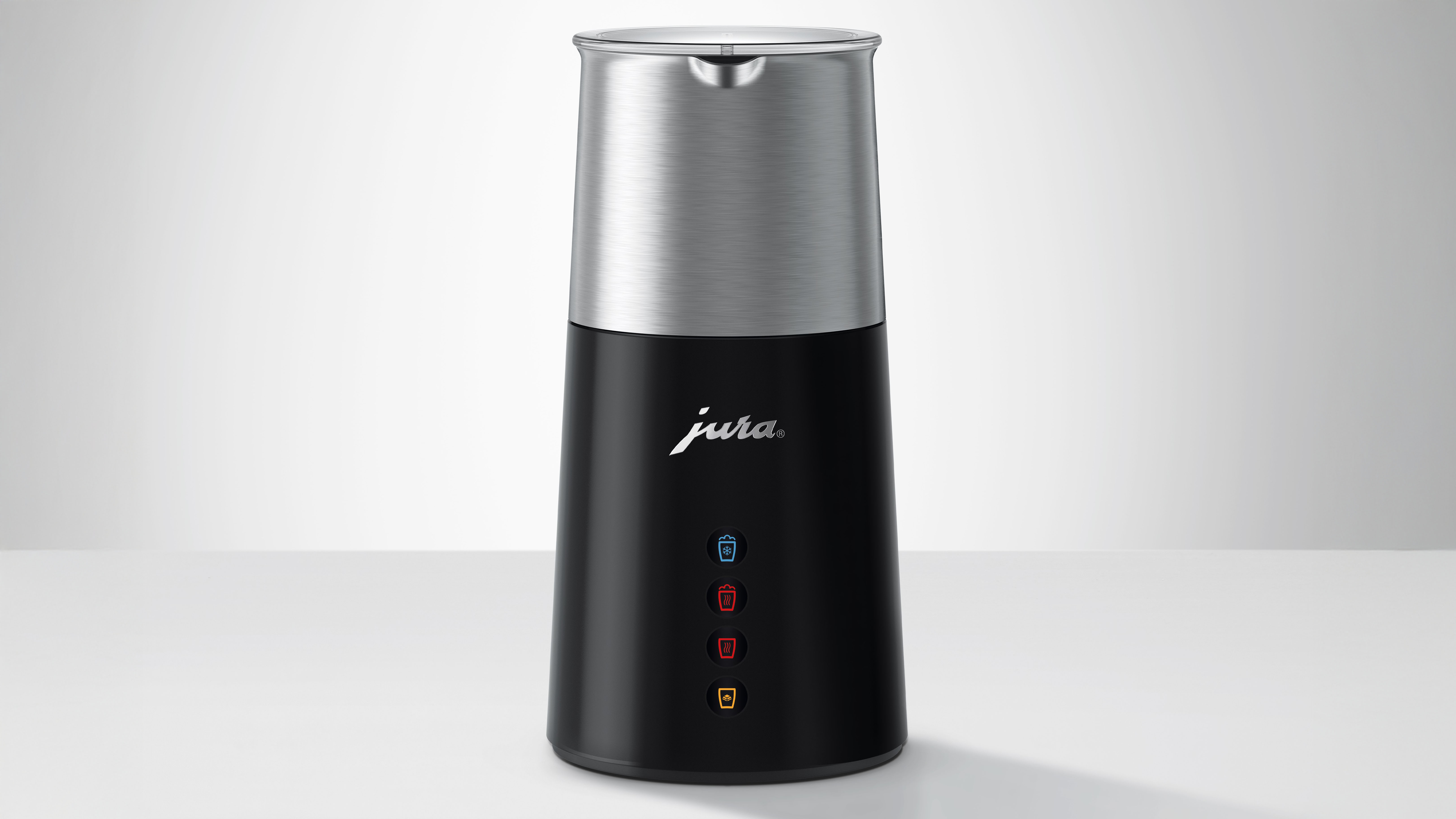 Jura Automatic Milk Frother on gray background