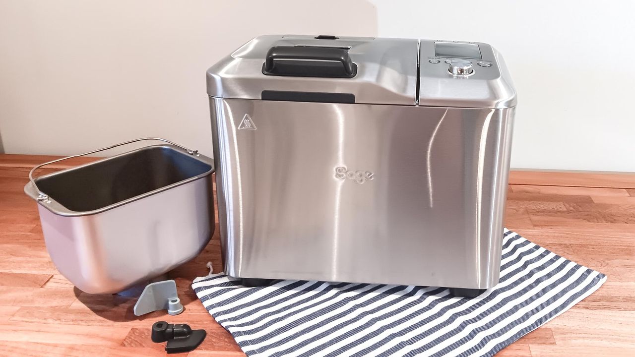 Breville The Custom Loaf bread machine on a wooden kitchen counter