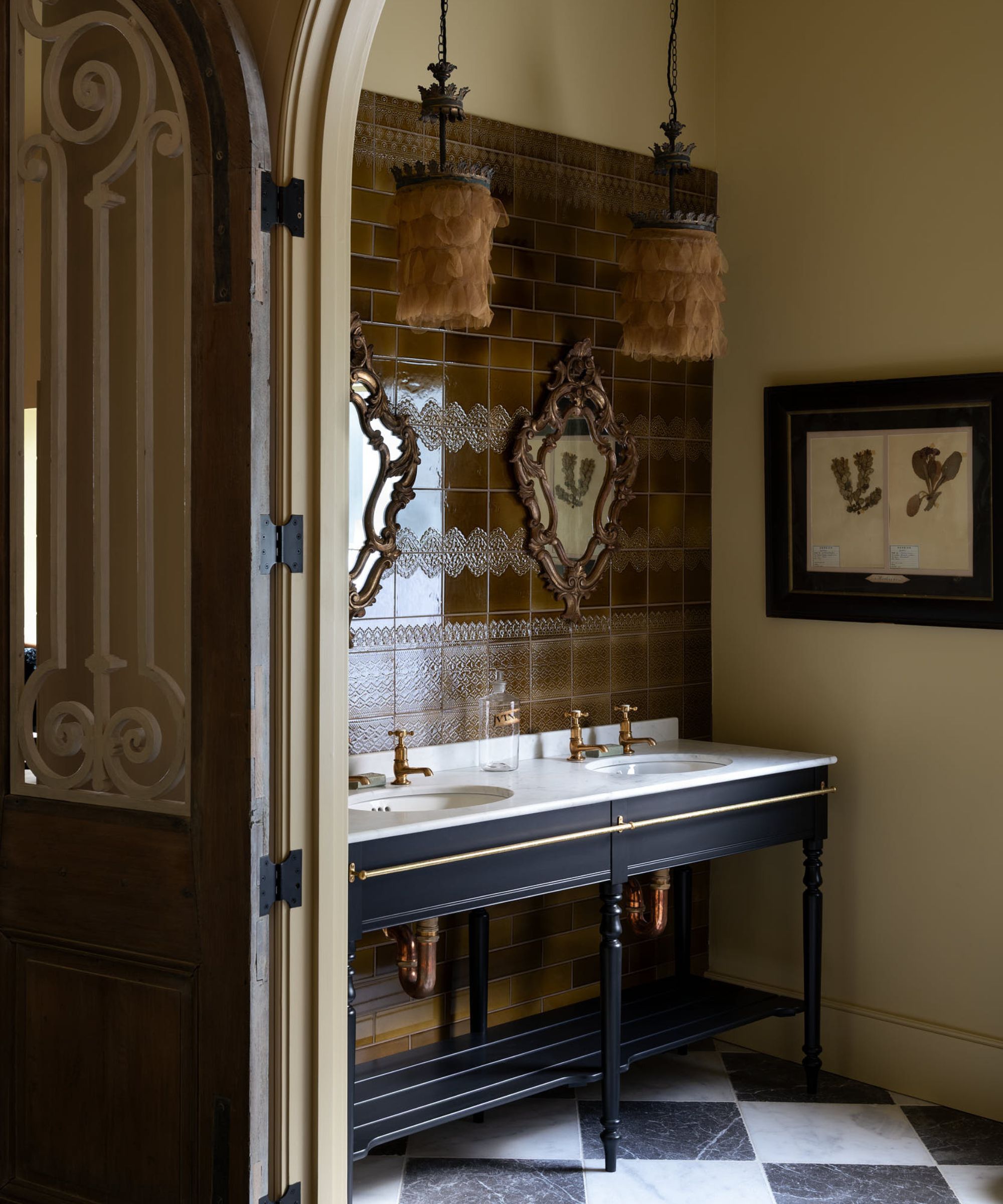 a large powder room featuring a washstand vanity and black and white checkerboard floor tiles