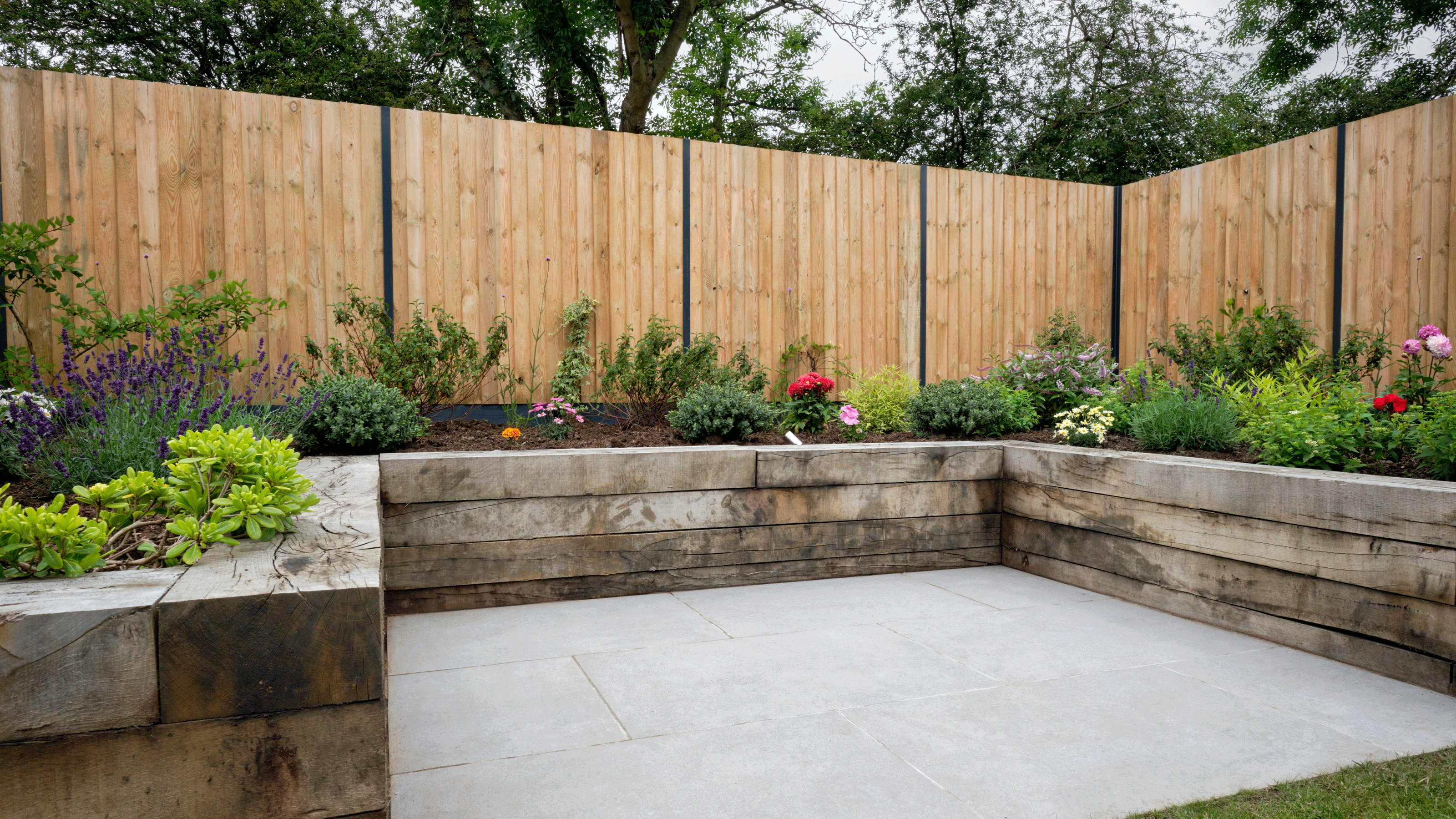 Fence with concrete paving