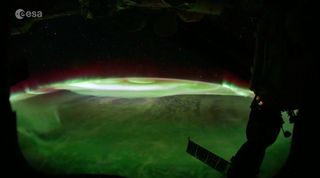 The Aurora Australis, also known as the southern lights, ripple and dance over Earth in this still from a stunning video by Italian astronaut Paolo Nespoli of the European Space Agency (ESA) on Aug. 20, 2017. ESA released the video Sept. 15.