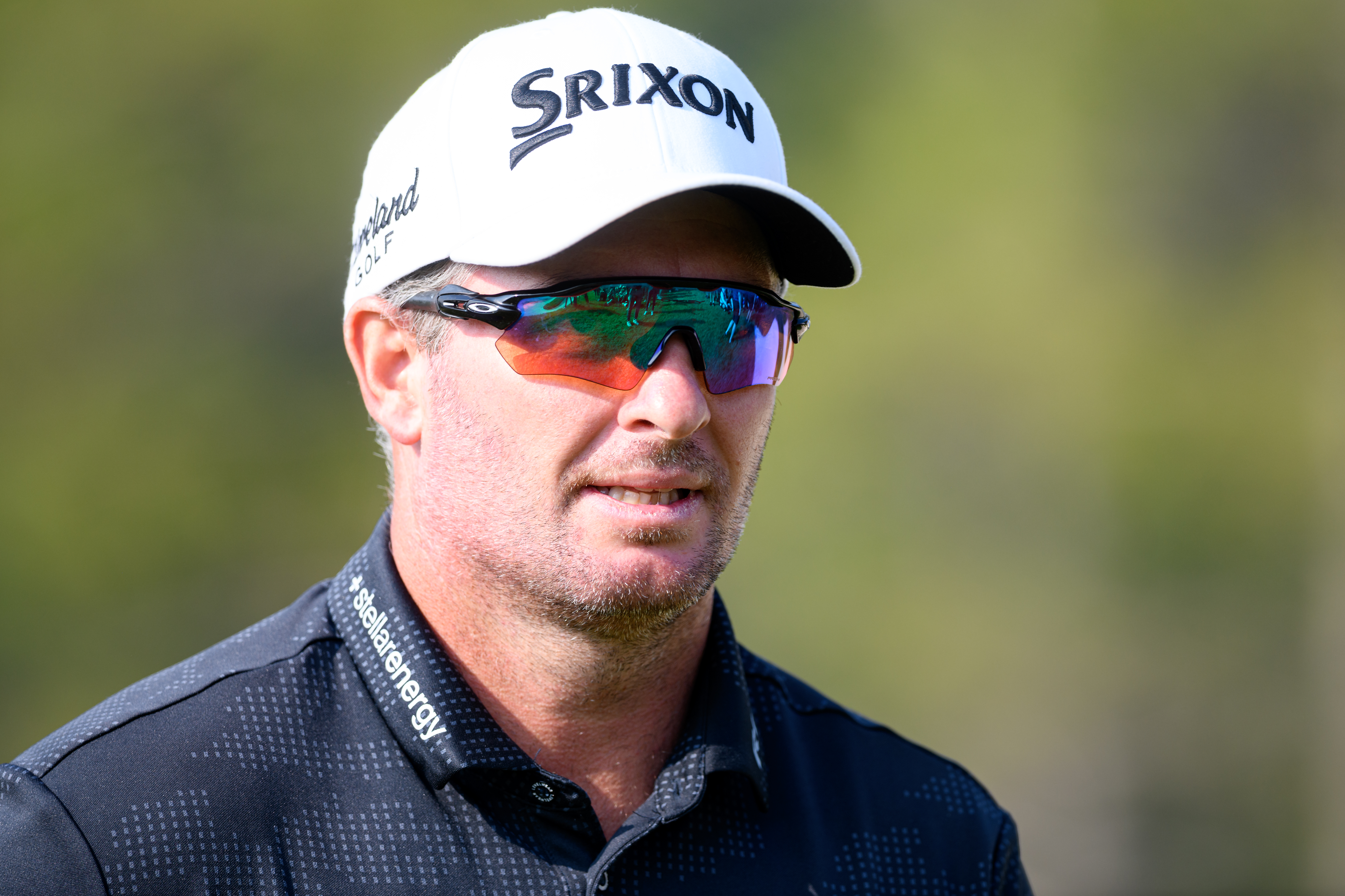 Ryan Fox walks down the fairway wearing sunglasses