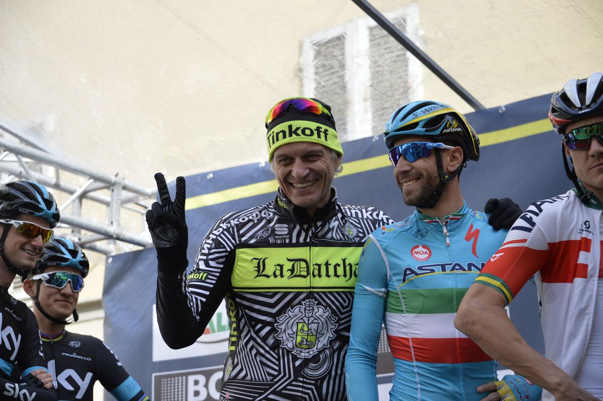 Tinkoff boss Oleg Tinkov has some fun on the podium with Vincenzo Nibali