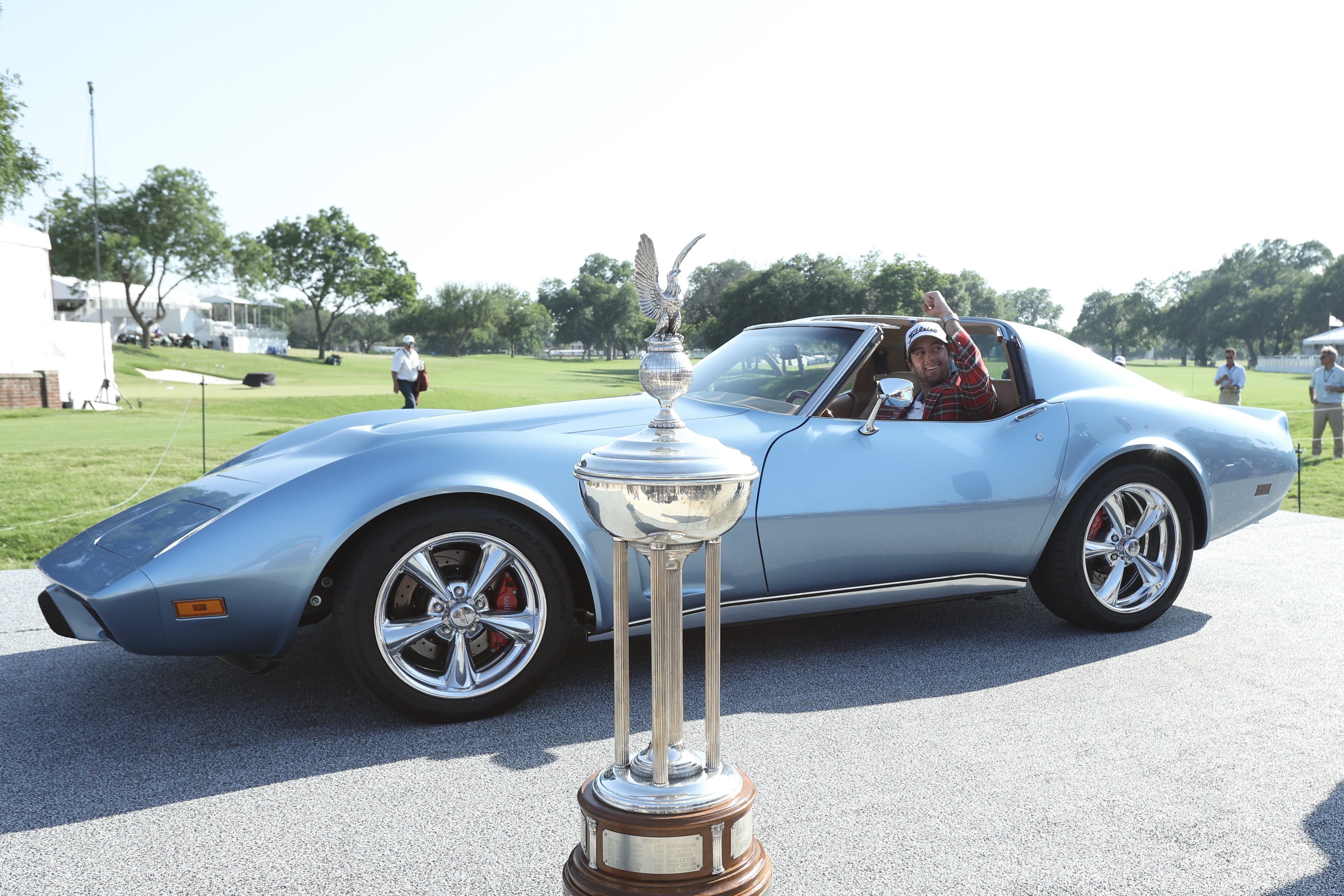 Davis Riley celebrates as he sits in a Corvette Stingray
