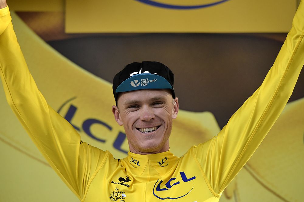 Chris Froome (Team Sky) wears the yellow jersey